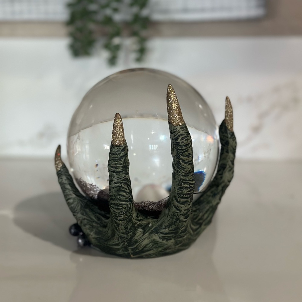 Witch Hand Holding Eyeball Snow Globe